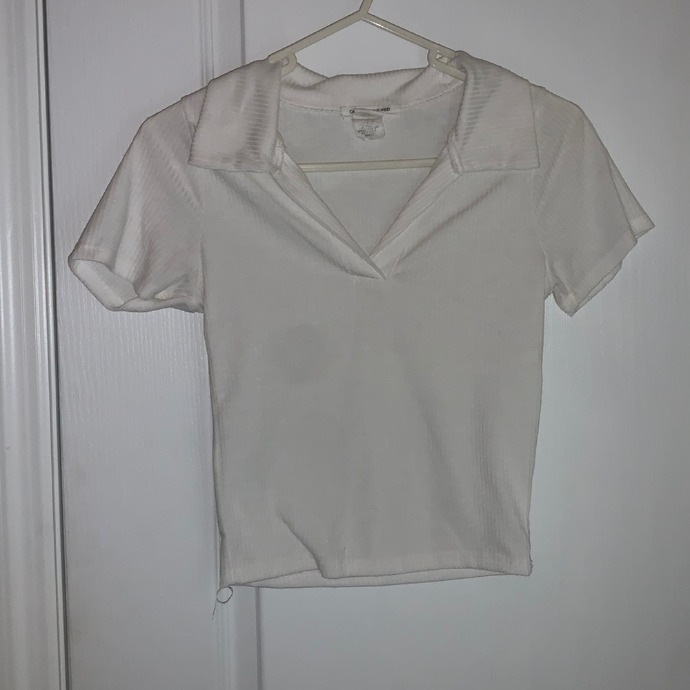 White tight, cropped, collared top